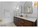 Modern bathroom with double vanity, large mirrors, and updated fixtures at 2068 Jasmine St, Denver, CO 80207