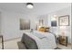 Basement bedroom with queen bed and tasteful decor at 2068 Jasmine St, Denver, CO 80207
