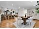 Open concept dining room next to a breakfast bar at 8782 S Ault Ln, Morrison, CO 80465