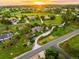 Aerial view showcasing a home with landscaped grounds and access to nearby amenities in a community at 17053 E Jamison Ave, Centennial, CO 80016