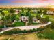 Sprawling neighborhood with lush green lawns, mature trees, and well-spaced single-Gathering homes at 17053 E Jamison Ave, Centennial, CO 80016