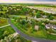 Expansive aerial view of the lush green properties in this desirable and luxurious neighborhood at 17053 E Jamison Ave, Centennial, CO 80016
