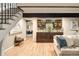 Built-in bar area adjacent to the living room, offering a stylish space for entertaining at 17053 E Jamison Ave, Centennial, CO 80016