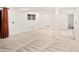 Spacious finished basement with carpet flooring and ample space for recreation at 17053 E Jamison Ave, Centennial, CO 80016
