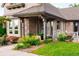 Another view of the front entrance with stone accents and pretty landscaping at 17053 E Jamison Ave, Centennial, CO 80016