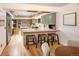 Stylish kitchen with modern appliances, a center island, and breakfast bar seating at 17053 E Jamison Ave, Centennial, CO 80016