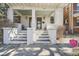 Inviting front porch with brick pillars and steps leading to the entrance at 636 N Logan St, Denver, CO 80203