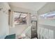 Bright sunroom with ample natural light and a view of the outside at 636 N Logan St, Denver, CO 80203