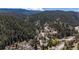 Gorgeous aerial view of the winding mountain roads surrounded by lush forestry at 41 Silver Spruce, Boulder, CO 80302