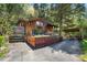 Inviting exterior showcasing a charming mountain home with a covered parking area at 41 Silver Spruce, Boulder, CO 80302