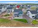 Aerial shot of landscaped home, highlighting backyard, fencing, and proximity to neighborhood amenities at 1172 Elbridge Cir, Elizabeth, CO 80107