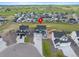 Aerial view of residential neighborhood with mountain backdrop and red location pin at 1172 Elbridge Cir, Elizabeth, CO 80107