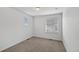 Bright bedroom with natural light and neutral carpet at 1172 Elbridge Cir, Elizabeth, CO 80107