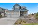 Charming two-story home featuring a spacious three car garage and quaint front porch at 1172 Elbridge Cir, Elizabeth, CO 80107