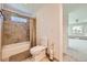 Cozy bathroom with tiled shower, bath tub, toilet, and neutral fixtures at 5583 Thunder Hill Rd, Parker, CO 80134