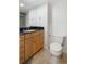 Updated bathroom featuring modern vanity with granite counters and tile flooring at 850 20Th St # 201, Boulder, CO 80302