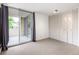 Bedroom with balcony access and wall storage at 850 20Th St # 201, Boulder, CO 80302