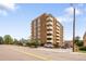 Exterior view of the apartment building featuring a well-maintained facade, balconies and a landscaped surrounding at 850 20Th St # 201, Boulder, CO 80302