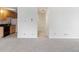 Hallway view into the kitchen with stainless steel appliances and plenty of cabinetry space at 850 20Th St # 201, Boulder, CO 80302