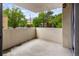 A serene patio offers outdoor relaxation space with views of the surrounding neighborhood and lush greenery at 850 20Th St # 201, Boulder, CO 80302