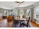 Open floor plan features a dining area with a round table and chairs at 3725 S Acoma St, Englewood, CO 80110