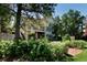 Picturesque backyard featuring a patio, balcony, and lush landscaping for outdoor enjoyment at 4845 S Gaylord St, Cherry Hills Village, CO 80113