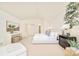 Bright main bedroom boasts neutral carpet, double doors to closet, and ample natural light at 4845 S Gaylord St, Cherry Hills Village, CO 80113