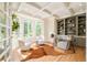 Bright office with bay windows, hardwood floors, custom built-ins, and plenty of natural light at 4845 S Gaylord St, Cherry Hills Village, CO 80113