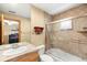 Bathroom with a combination shower and tub featuring neutral walls, a shelf and framed mirror at 7465 Kelty Trl, Franktown, CO 80116