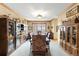 Formal dining room featuring wood furniture, carpet, and a large window with scenic views at 7465 Kelty Trl, Franktown, CO 80116