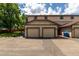 Charming exterior view of the home showcasing the attached two-car garage at 902 S Yukon St, Lakewood, CO 80226