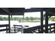 Beautiful view of a lake from a wooden structure at 902 S Yukon St, Lakewood, CO 80226