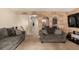 Inviting living room with brick archways and two comfortable sofas at 902 S Yukon St, Lakewood, CO 80226