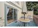 Townhouse featuring sliding door access to a deck with a patio umbrella and outdoor seating at 912 S Paris Ct, Aurora, CO 80012