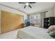 Bright bedroom with carpet, closet, window and contemporary furniture, perfect for relaxation at 912 S Paris Ct, Aurora, CO 80012