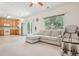 Bright and airy living space, with a combined kitchen and living area and sliding patio door at 7371 S Mobile St, Aurora, CO 80016