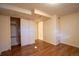 Bright bedroom with wood floors and closet, offering comfort and functionality at 2744 S Newton Way, Denver, CO 80236