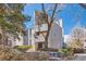 Condominium complex features professionally landscaped grounds and modern architecture under a sunny blue sky at 6470 S Dayton St # K12, Englewood, CO 80111