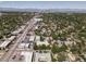Wide angle aerial view of home location among city streets and businesses at 1543 Glencoe St, Denver, CO 80220