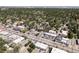 High angle aerial view of a home and the businesses nearby at 1543 Glencoe St, Denver, CO 80220