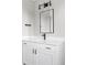 Contemporary bathroom with modern vanity, sleek fixtures, and stylish lighting at 1543 Glencoe St, Denver, CO 80220
