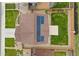 Aerial view of home showing the roof with solar panels and the fenced backyard at 2510 E 160Th Pl, Thornton, CO 80602