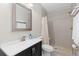 Bathroom featuring modern fixtures, neutral tile and a glass shower at 2510 E 160Th Pl, Thornton, CO 80602