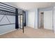 Bedroom featuring a bunk bed, carpeted floors, and a closet, creating a cozy space at 2510 E 160Th Pl, Thornton, CO 80602