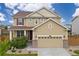 Charming two-story home with a well-maintained lawn and a two-car garage, perfect for families at 2510 E 160Th Pl, Thornton, CO 80602