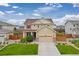 Beautiful two-story home with landscaped front yard, featuring a spacious driveway and inviting curb appeal at 2510 E 160Th Pl, Thornton, CO 80602
