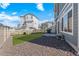 A well-kept backyard featuring a green lawn, fence, and rock features at 4419 N Quatar Ct, Aurora, CO 80019