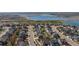 Bird's-eye view of a well-planned residential area bordering open land and lakes at 5659 Viewpoint Ave, Firestone, CO 80504