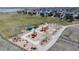 Aerial view featuring a vibrant playground in a new development, perfect for Gathering fun at 5659 Viewpoint Ave, Firestone, CO 80504