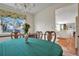 Dining area near the kitchen featuring a chandelier and a traditional table at 8179 S Corona Way, Centennial, CO 80122